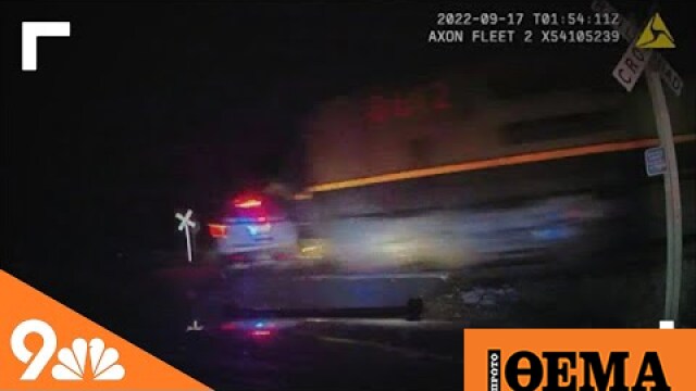 WebTV - Video shows train hitting police cruiser with suspect inside